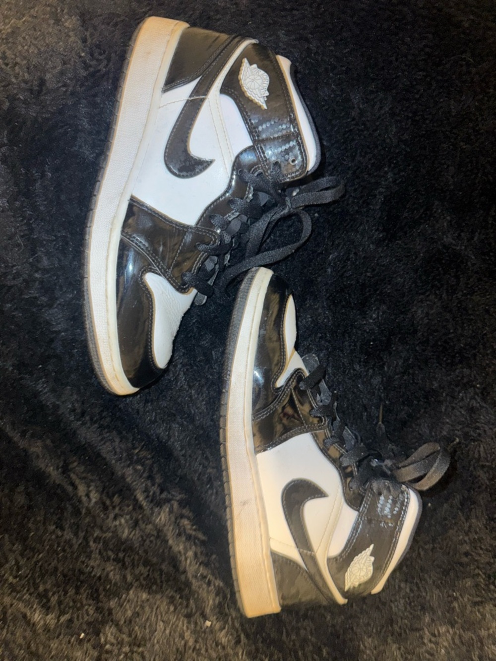 Jordan Black and White Patent Leather Mid-Top Sneakers
